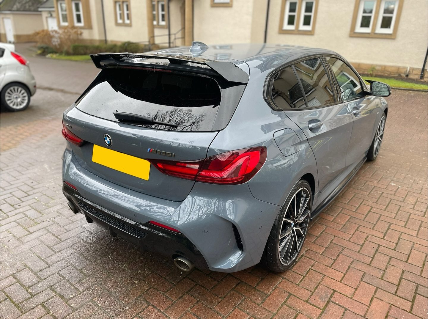 Back view of a grey BMW M135i in Edinburgh