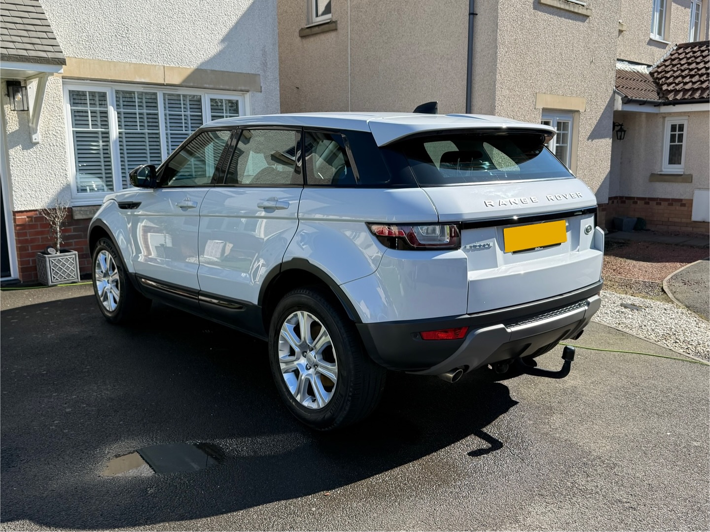 Back end of white Range Rover Evoque in Edinburgh